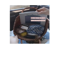 Woven handbag with contents.
