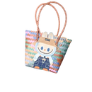 Colorful woven tote bag with bunny patch.