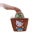 Brown woven handbag with Hello Kitty design.