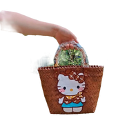 Brown woven handbag with Hello Kitty design.