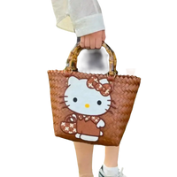 Brown woven Hello Kitty handbag.
