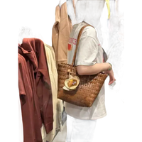 Brown woven tote bag.