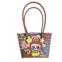Woven tote bag with cartoon character.