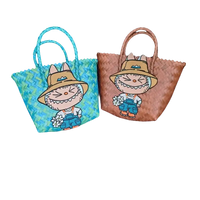 Two woven tote bags with cartoon character.