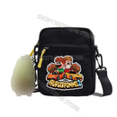 Black shoulder bag with cartoon sticker.