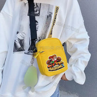 Yellow cartoon-themed crossbody bag.
