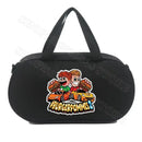 Black duffel bag with cartoon graphic.