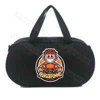 Black duffel bag with cartoon graphic.