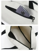 White and black striped tote bag.