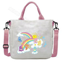 Care Bears tote bag with pink straps.