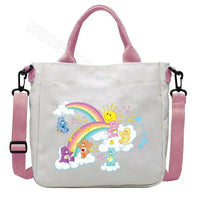 Care Bears tote bag with pink straps.