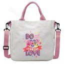 White canvas tote bag with pink accents.