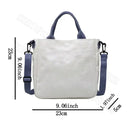 White tote bag with blue handles and strap.