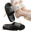 Cartoon-themed slide sandals.