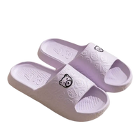 Lavender bear-themed slide sandals.