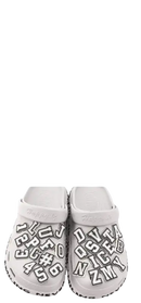 Crocs with letter charms.