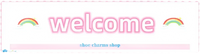 Welcome’ sign with rainbows.