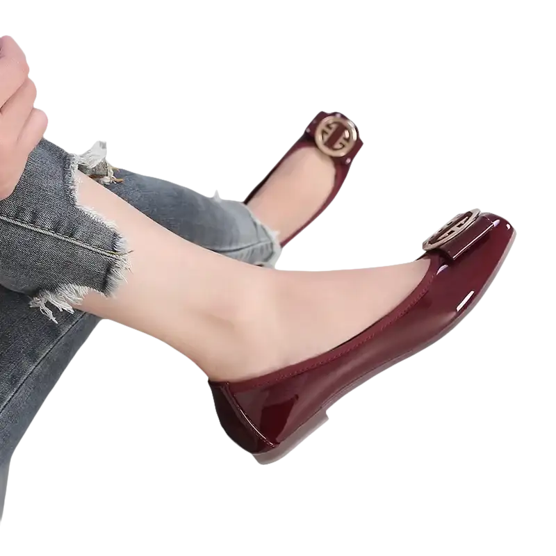 Burgundy patent leather ballet flats.