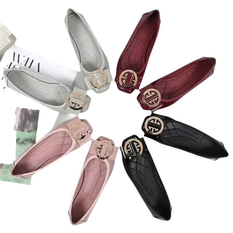 Patent leather ballet flats with decorative buckle.