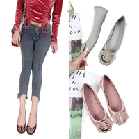 Patent leather ballet flats.