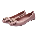 Pair of pink patent leather ballet flats with bow detail.