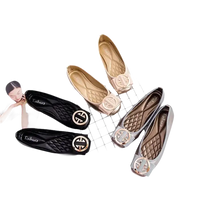 Shiny ballet flats with decorative buckles.