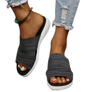 Gray knit slide sandals.