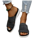 Gray knit slide sandals.