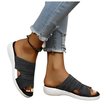 Gray knit slide sandals.