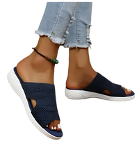 Navy blue knit slide sandals.