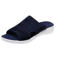 Navy blue knit slide sandal.