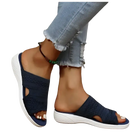 Navy knit slide sandals.