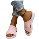 Pink knit slide sandals.