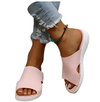 Pink knit slide sandals.