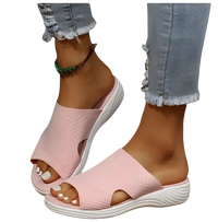 Pink knit slide sandals.