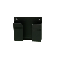 Black wall-mounted storage organizer for trendy wall mount phone setups on Phoneplugbox Wall Mount