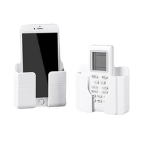 White plastic wall mount phone storage containers on Chill With Your Phone phoneplugbox wall mount wizard