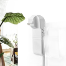 White wall mount phone holder on Phoneplugbox Wall Mount Wizard, punch free wall mount