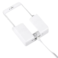 White wall mount phone dock charging on Phoneplugbox Wall Mount Wizard punch free wall mount