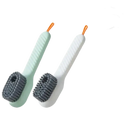 Two-piece white and green cleaning brushes.