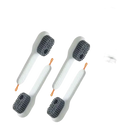 Four white cleaning brushes.