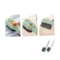 Cleaning brush with soap dispenser.