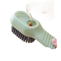 Green liquid-dispensing cleaning brush.