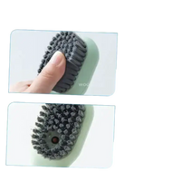 Soft bristle cleaning brush.