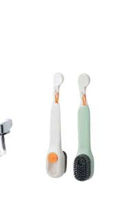 Two hanging cleaning brushes.