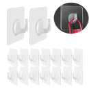 Transparent adhesive wall hooks.