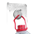 Adhesive wall hook holding water bottle.