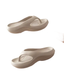 Beige platform flip-flops.