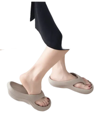 Beige platform flip-flops.