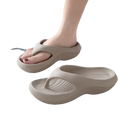 Beige platform flip-flops.
